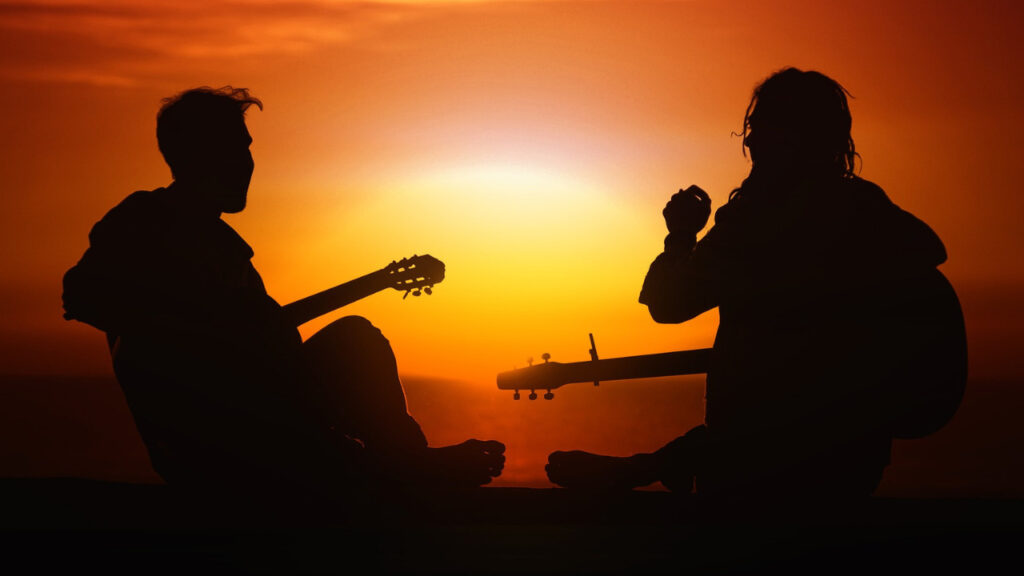 夕日とギタリスト